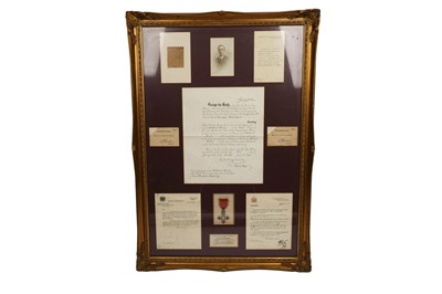 Lot 68 - ﻿﻿A framed George VI OBE medal and paperwork