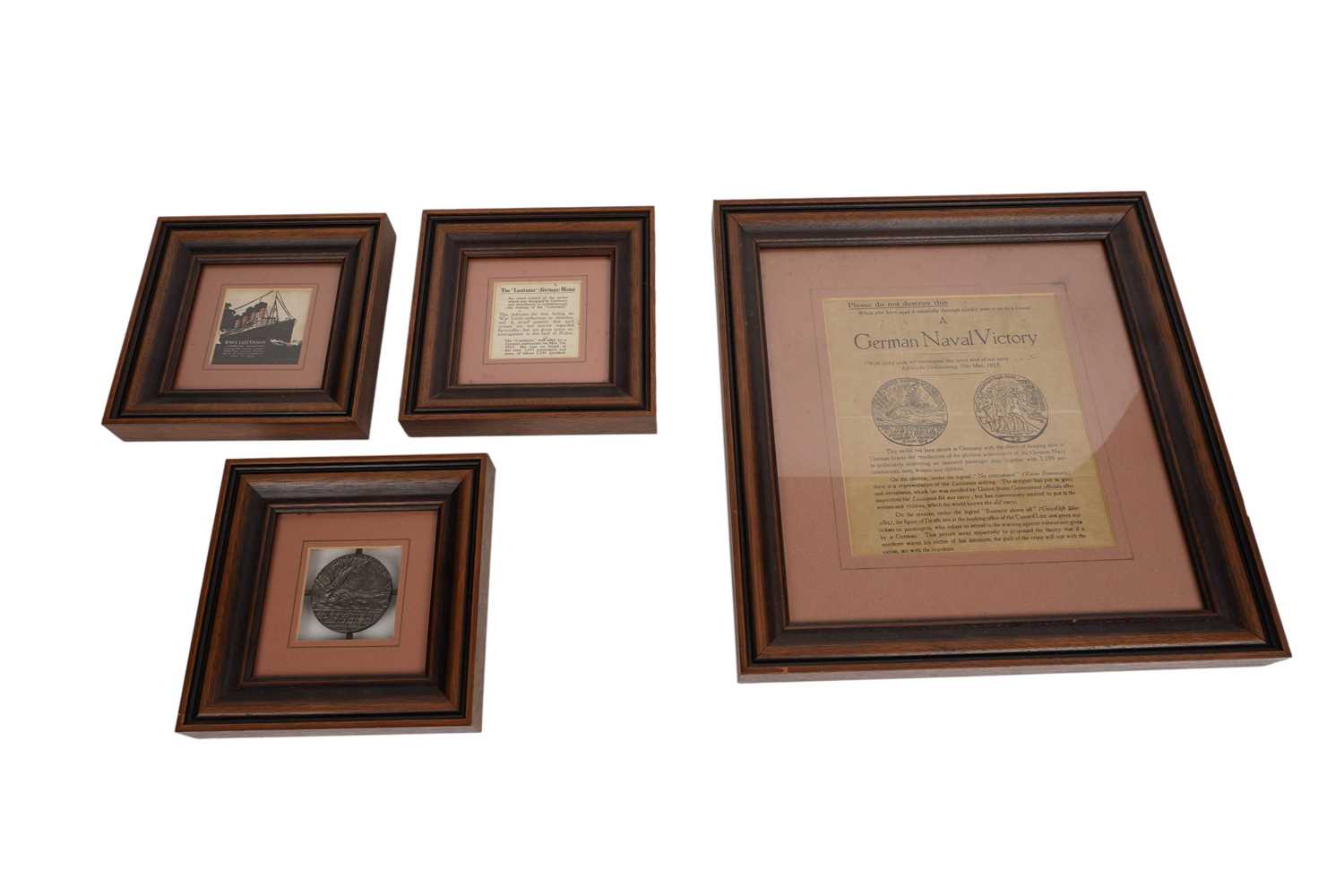 Lot 220 - A First World War British 'Lusitania' propaganda medal and ephemera, all framed