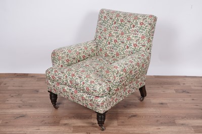 Lot 81 - A Howard and Sons style armchair