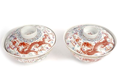 Lot 850 - A pair of Chinese famille rose bowls and covers