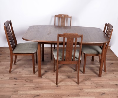 Lot 133 - G-plan: a set of four oak dining chairs; and a table