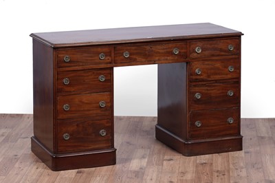 Lot 11 - A Victorian mahogany pedestal kneehole desk