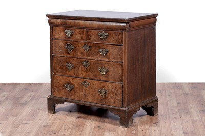 Lot 13 - An early 18th Century burr walnut and banded chest of drawers