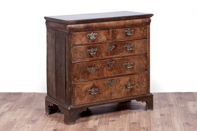 Lot 13 - An early 18th Century burr walnut and banded chest of drawers