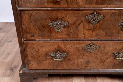 Lot 13 - An early 18th Century burr walnut and banded chest of drawers