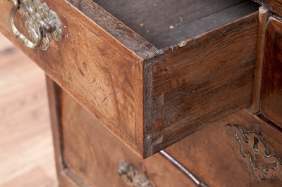 Lot 13 - An early 18th Century burr walnut and banded chest of drawers