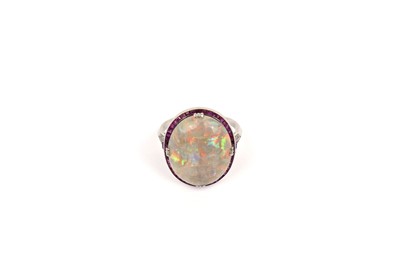 Lot 641 - An Art Deco opal, ruby and diamond dress ring