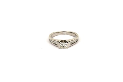 Lot 638 - A princess-cut diamond ring