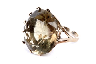 Lot 216 - A smoky quartz cocktail ring