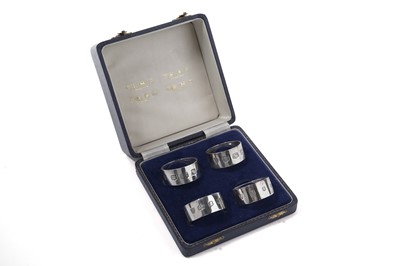 Lot 950 - A cased set of Elizabeth II silver napkin rings, 1967