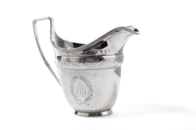 Lot 1049 - A Georgian Newcastle silver cream jug