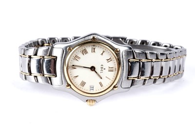 Lot 338 - Ebel: a lady's stainless steel and gold wristwatch