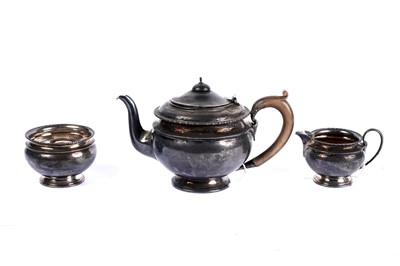 Lot 1072 - A George V three-piece silver tea service