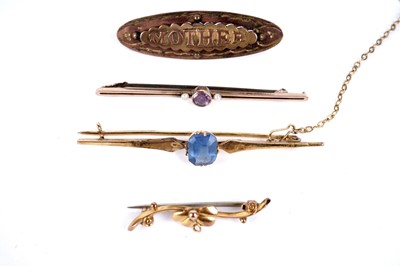 Lot 330 - An amethyst and seed pearl bar brooch; and three other brooches