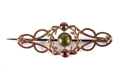 Lot 331 - A Women's Suffrage type peridot, amethyst and gold bar brooch