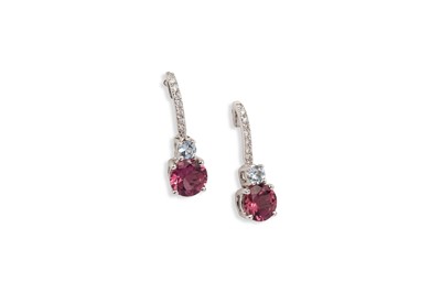 Lot 676 - A pair of tourmaline and diamond earrings