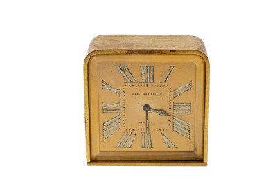 Lot 223 - An Art Deco Udall and Ballou gilt cased desk clock