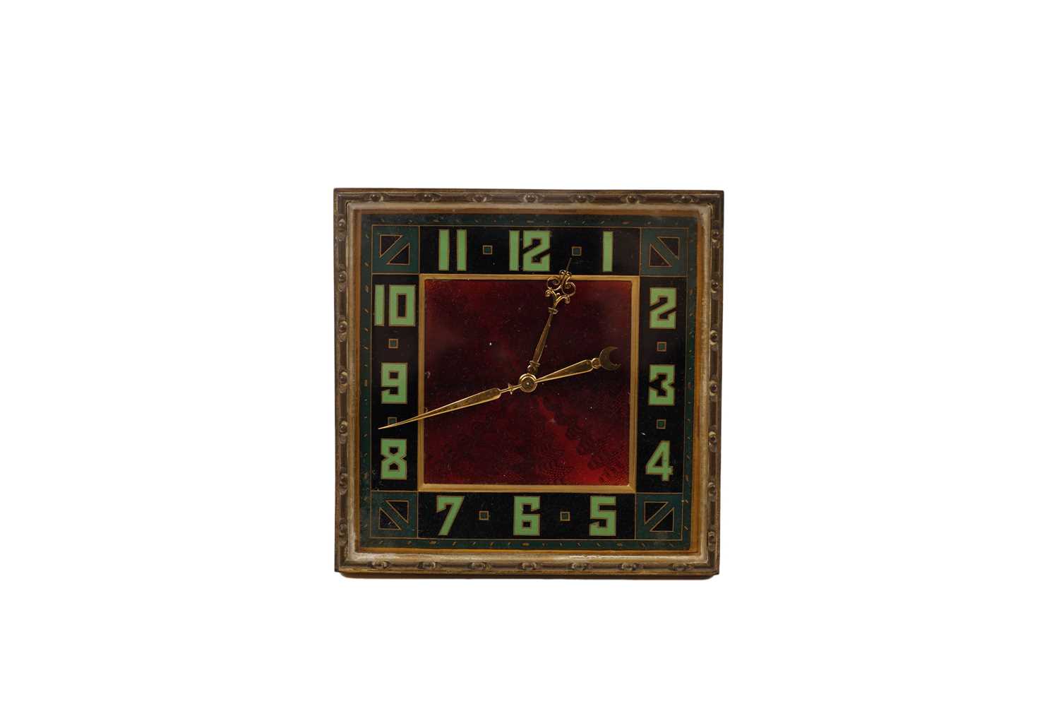 Lot 227 - An Art Deco gilt cased travel/desk clock