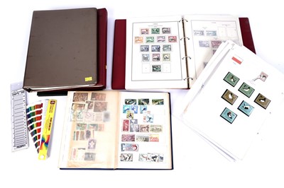 Lot 229 - A collection of British and Commonwealth stamps in albums and loose