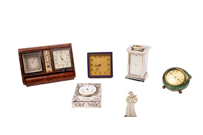 Lot 194 - A selection of early 20th Century and later travel/desk clocks; and a chrome figure