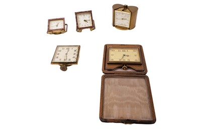 Lot 195 - A Semca gilt cased travel alarm clock; and a selection of other desk/travel clocks