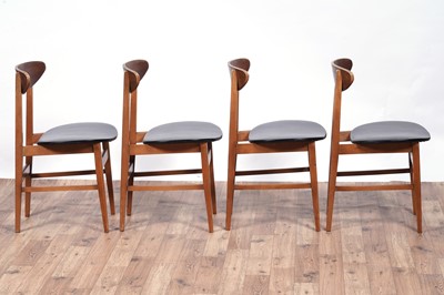 Lot 28 - A Mid Century teak extending dining table and chairs