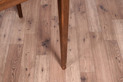 Lot 28 - A Mid Century teak extending dining table and chairs