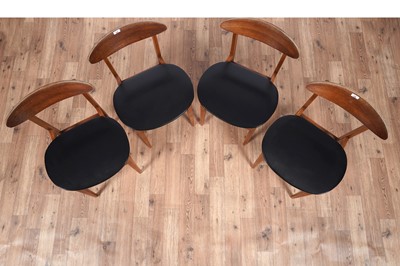 Lot 28 - A Mid Century teak extending dining table and chairs