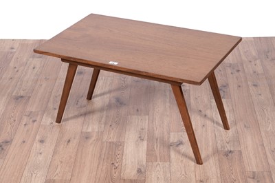 Lot 28 - A Mid Century teak extending dining table and chairs