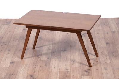 Lot 28 - A Mid Century teak extending dining table and chairs