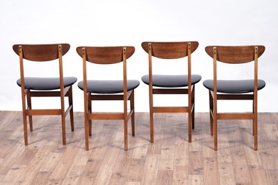 Lot 28 - A Mid Century teak extending dining table and chairs