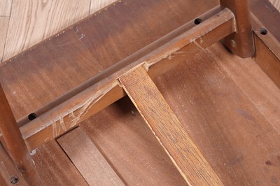 Lot 28 - A Mid Century teak extending dining table and chairs