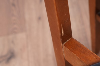 Lot 28 - A Mid Century teak extending dining table and chairs