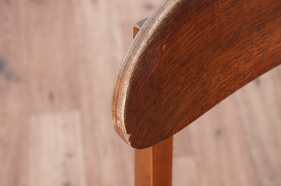 Lot 28 - A Mid Century teak extending dining table and chairs