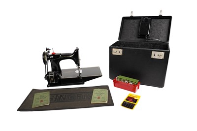 Lot 43 - A Singer 221k electric sewing machine