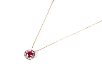 Lot 97 - Amendment - a synthetic ruby and diamond cluster pendant necklace