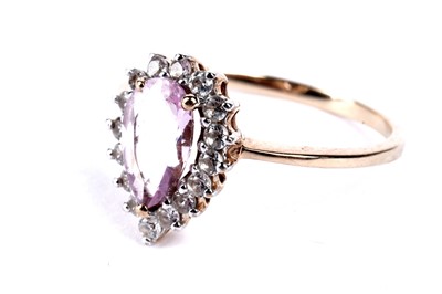 Lot 107 - An Imperial pink topaz and white zircon cluster dress ring