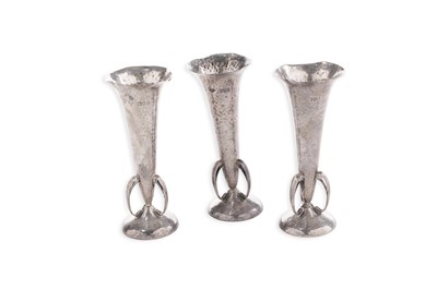 Lot 182 - A set of three Edwardian silver art nouveau vases