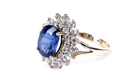 Lot 114 - A Tibetan kyanite and white zircon cluster ring