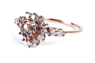 Lot 118 - A pink diamond cluster dress ring