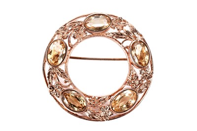 Lot 237 - A 9ct yellow gold and citrine set brooch