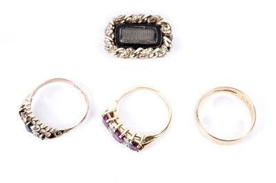 Lot 244 - Three rings; and a mourning brooch