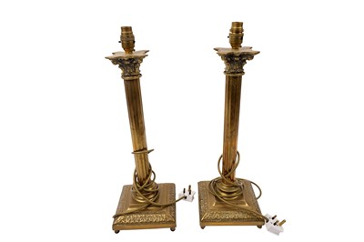 Lot 196 - ﻿A pair of 20th Century brass Corinthian column lamps