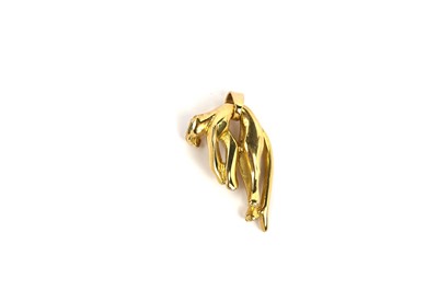 Lot 802 - A Cartier style 18ct yellow gold panther pendant