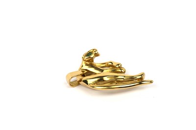 Lot 802 - A Cartier style 18ct yellow gold panther pendant