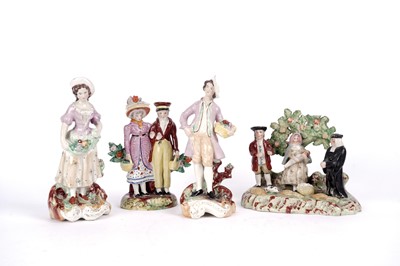 Lot 985 - A Staffordshire Tythe pig group; and other Staffordshire figures and groups