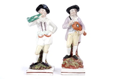 Lot 988 - A pair of Neale type figures of musicians