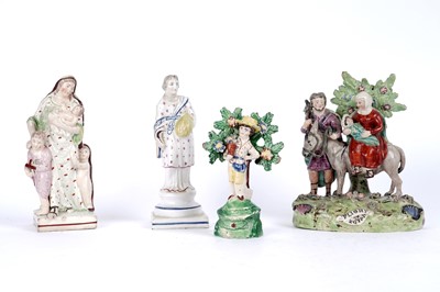 Lot 989 - A Walton pearlware figure group; and other decorative ceramic figures