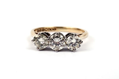 Lot 804 - A three stone diamond ring