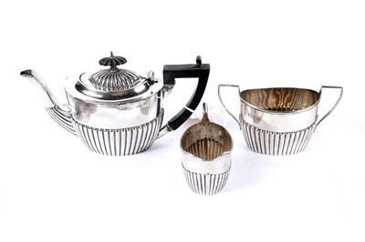 Lot 1073 - A three-piece silver bachelors tea service